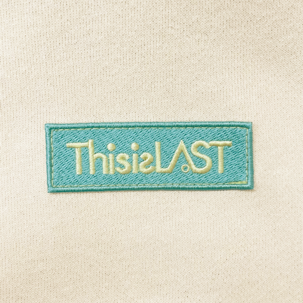 ロゴワッペントレーナー[グレージュ]