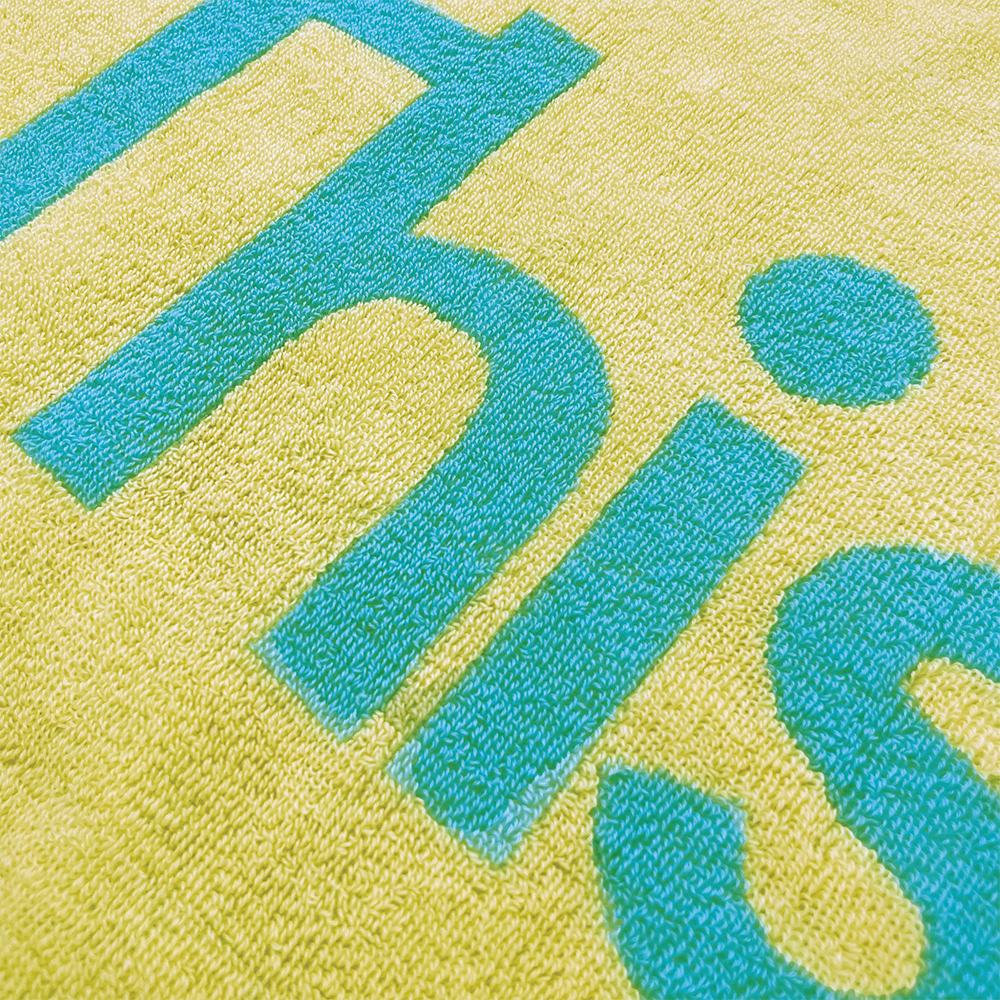 ロゴジャガードタオル [クリームイエロー×グリーン]