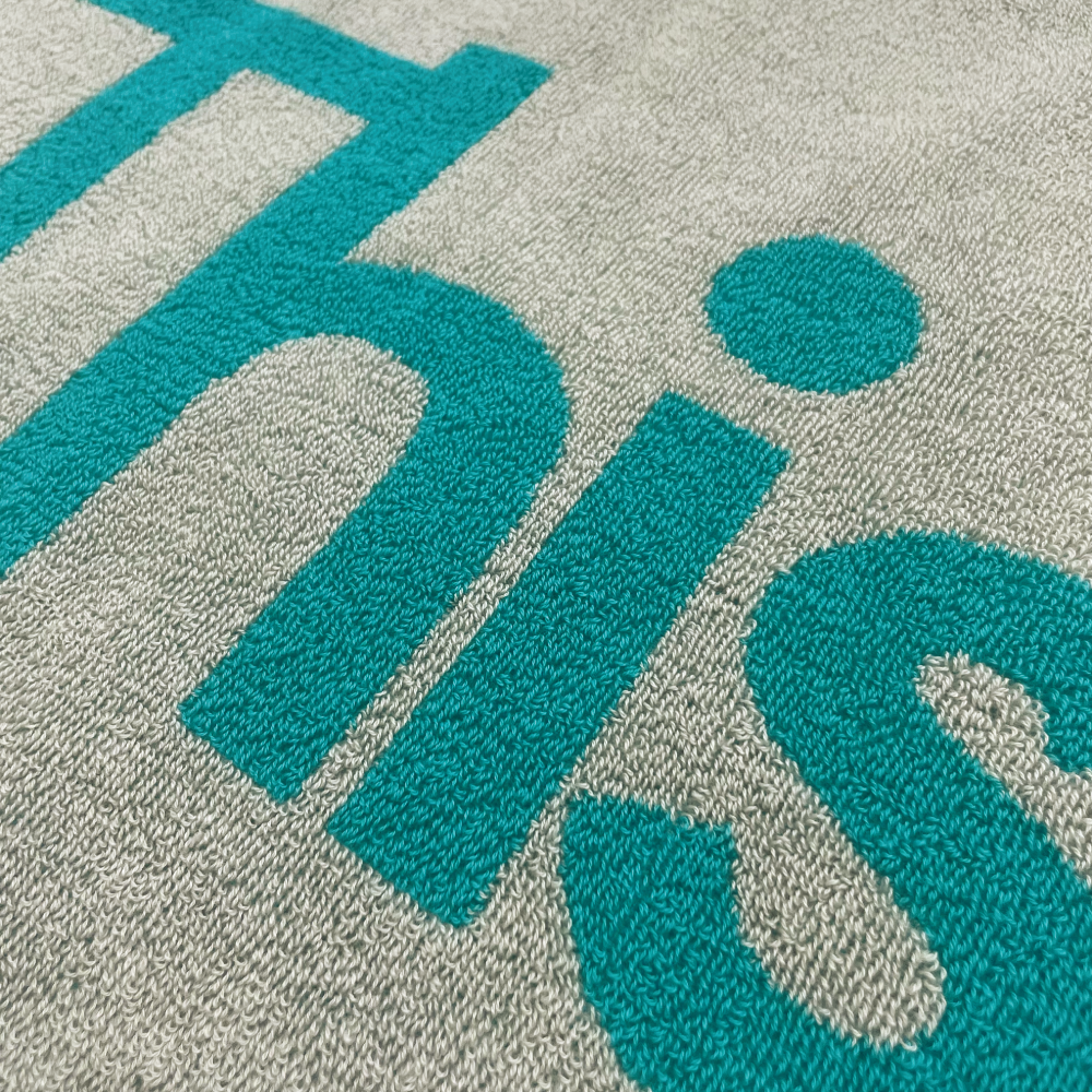 ロゴジャガードタオル [ライトグレー×アクアグリーン]