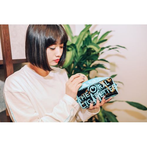 グランジ目玉ロゴエナメルポーチ